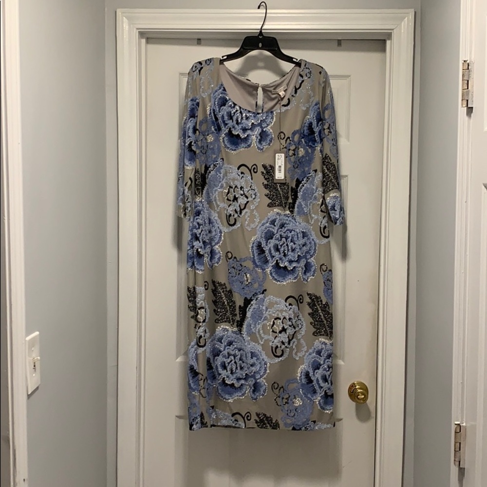 It’s a silver and blue flowered dress